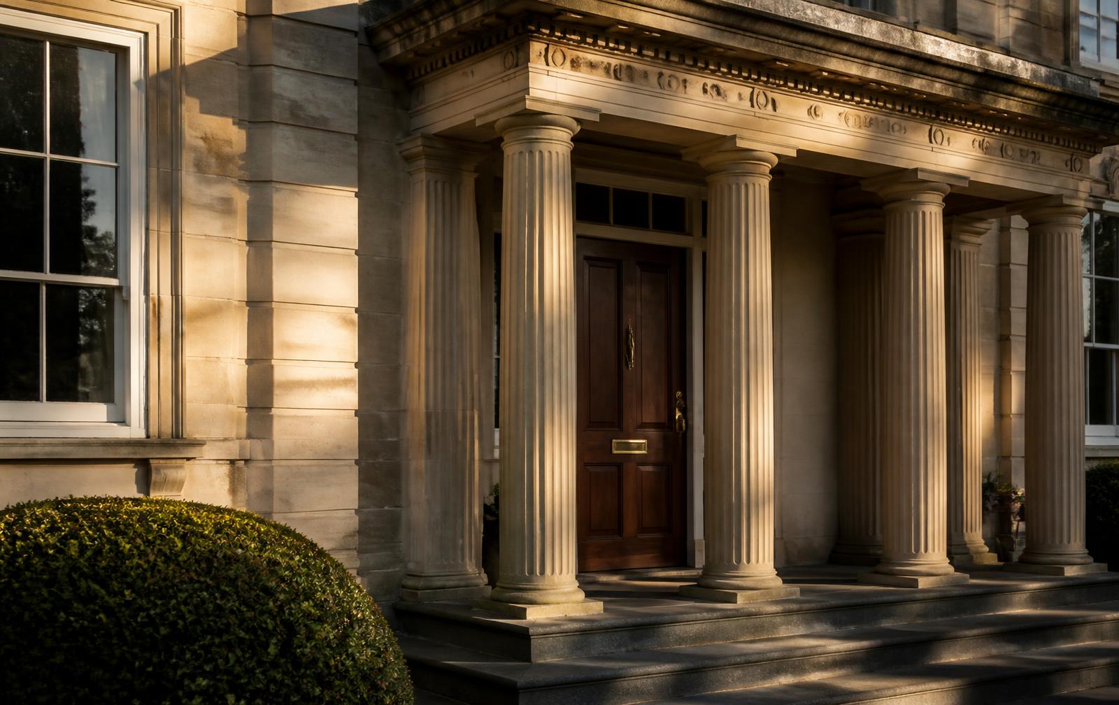 Limestone portico and columned entry of a Georgian estate in Foxcroft