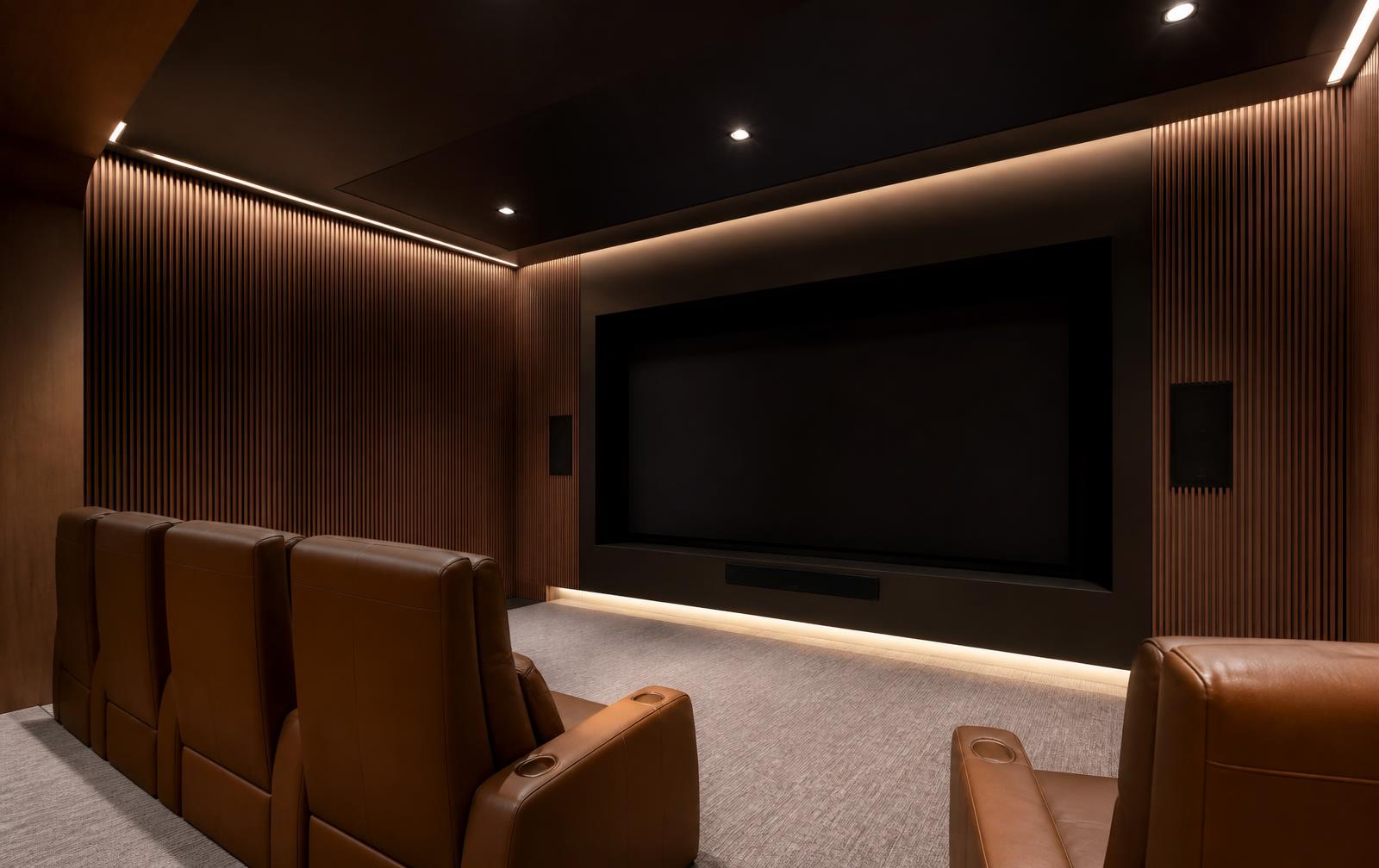 A walnut-clad private home theater in a Foxcroft smart home
